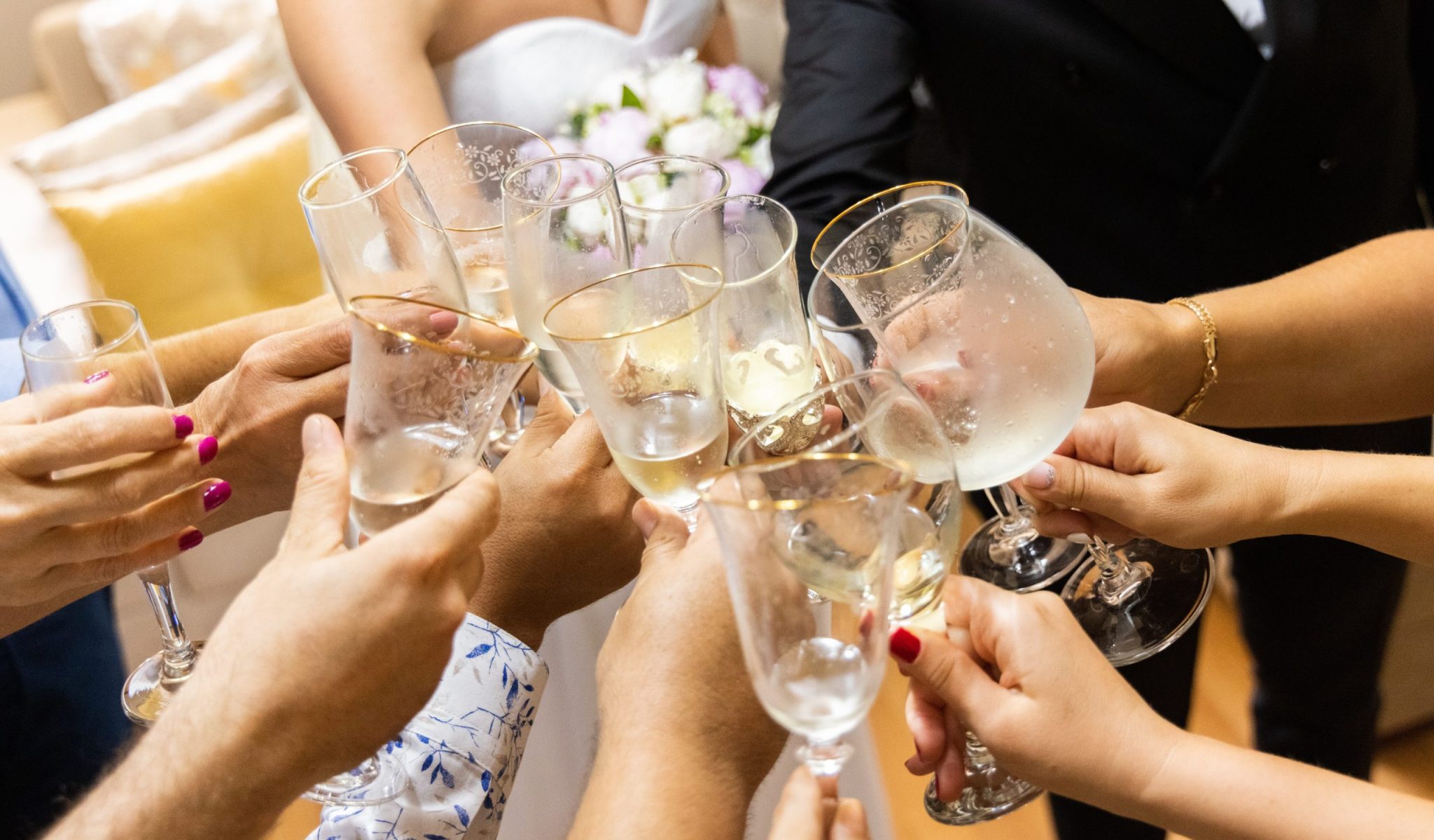 guests-cheers-at-wedding-party